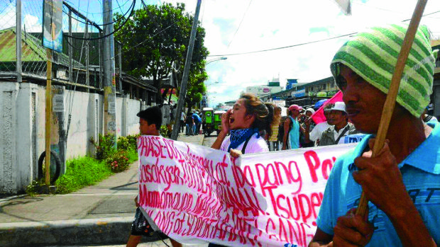Protesters take to the streets in Naga City to air their demands for social justice and respect for human rights which they said the Duterte administration is neglecting. —CONTRIBUTED PHOTO
