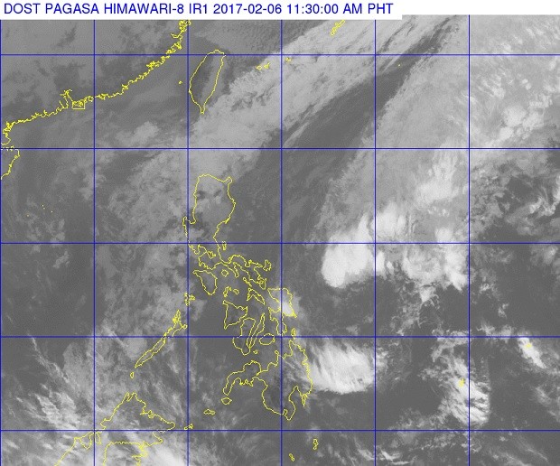 Tropical depression 'Bising' (middle, right) can be seen farther from the country in this Pagasa satellite photo released before midday Monday, Feb. 6, 2017. PAGASA PHOTO