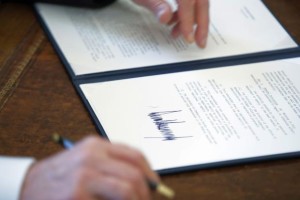 Donald Trump signs an executive order - 24 Jan 2017