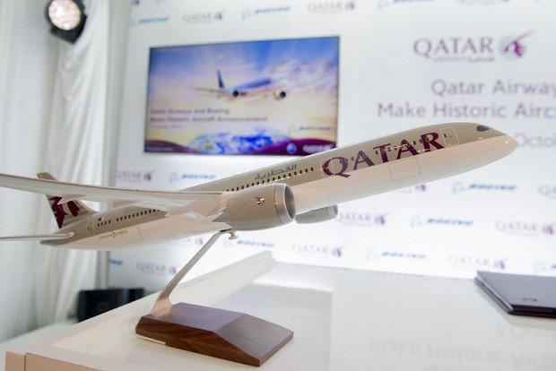 A model of a Qatar Airways Boeing 787 Dreamliner airplane is seen following the airline's announcement of a purchasing deal for 100 Boeing airplanes in an order worth $18.6 billion, in Washington, DC, October 7, 2016. / AFP PHOTO / SAUL LOEB