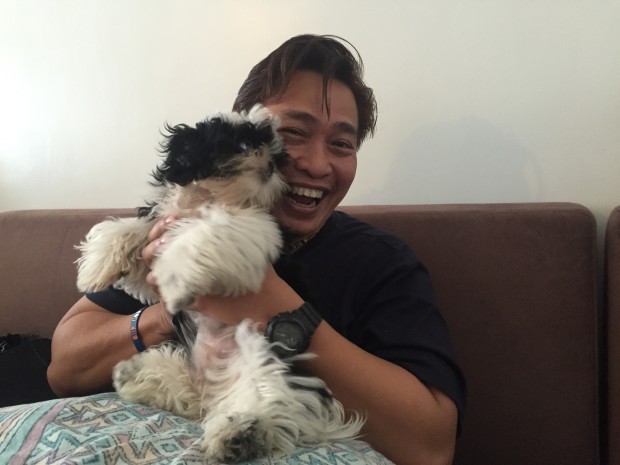 Ifugao Rep. Teddy Baguilat with his dog Vader. Photo by Marc Jayson Cayabyab