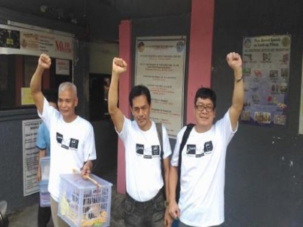 In this Aug. 17, 2016 file photo from Karapatan.org, Tirso Alcantara, Renante Gamara and Ernesto Lorenzo, all consultants to the communist rebel negotiator, National Democratic Front of the Philippines, are released from prison. (Photo from Karapatan.org)