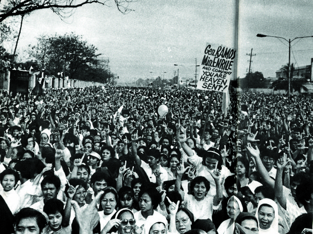 PEOPLE POWER REVOLUTION People occupied Edsa for several days to protect reformist soldiers involved in a coup attempt against the Marcos regime in February 1986.