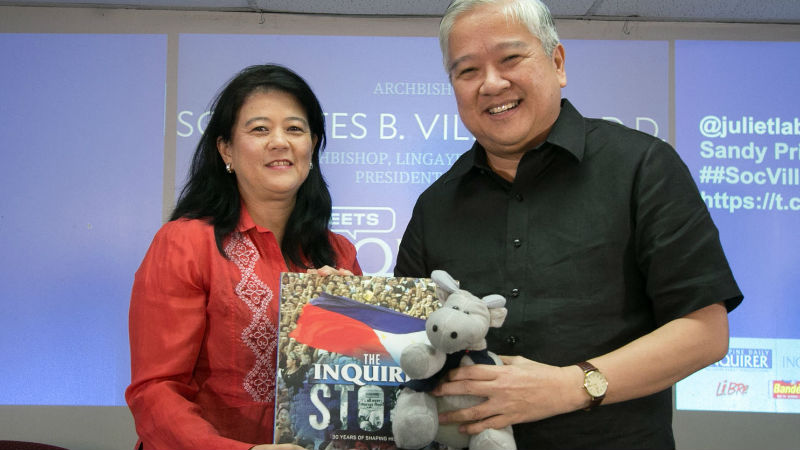 INQUIRER FORUM GUEST Archbishop Socrates Villegas, the guest in the Meet Inquirer Multimedia forum on Monday, receives tokens from Inquirer president/CEO Alexandra Prieto-Romualdez. —ALEXIS CORPUS