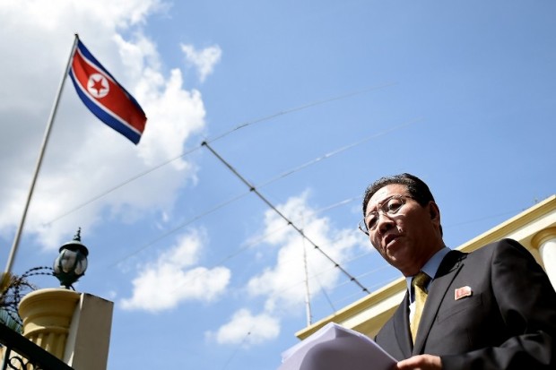 Kang Chol, North Korea's ambassador to Malaysia, addresses journalists outside the North Korean Embassy in Kuala Lumpur on February 20, 2017.  North Korea cannot trust the Malaysian police investigation into the death of its leader's half-brother, Pyongyang's ambassador said after being summoned in the wake of the assassination of Kim Jong-Nam. / AFP PHOTO / MANAN VATSYAYANA