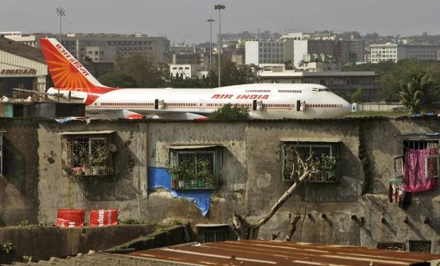 Air India plane over Mumbai in India - 25 May 2010