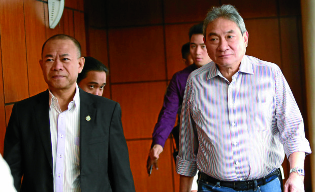 Mighty Corp. president Alex Wongchuking (right)—MARIANNE BERMUDEZ/INQUIRER FILE PHOTO