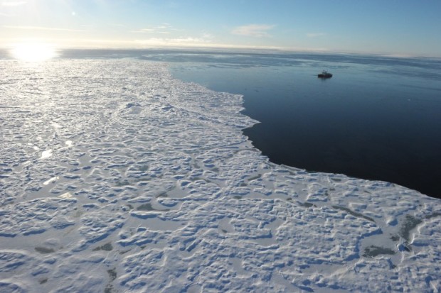 TO GO WITH AFP STORY BY CLEMENT SABOURIN "CANADA-ENVIRONMENT-ARCTIC-WARMING" In this September 27, 2015 photo, an aerial view of the CCGS Amundsen, a Canadian reasearch ice-breaker navigating near an ice floe along Devon Island, in the canadian High Arctic. Every year the Amundsen spends 4-5 months in the Canadian Arctic supporting Canadian research programs and collaborations with industry and international partners.CCGS Amundsen is navigating waters that should be frozen over this time of year. Warming has forced a retreat of the polar ice cap, opening up a sea route through the Canadian Arctic Archipelago and connecting the Atlantic and Pacific Oceans for several months of the year.     AFP PHOTO / CLEMENT SABOURIN / AFP PHOTO / Clement Sabourin