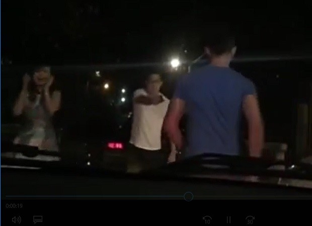 This video grab shows an unidentified man (center) and nurse Ephraim Montalbo during a confrontation along F. Sotto Street in Cebu City on before dawn Sunday, March 19, 2017. SCREENGRAB FROM MOTORIST'S VIDEO