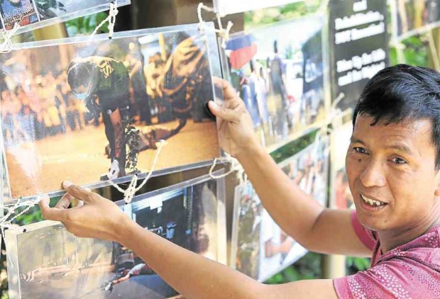 Through his camera, Bro. Ciriaco “Jun” Santiago documents killings linked to the government’s war on illegal drugs. Some of his photos were put on exhibit at Baclaran church in December last year.—Photos by MARIANNE BERMUDEZ