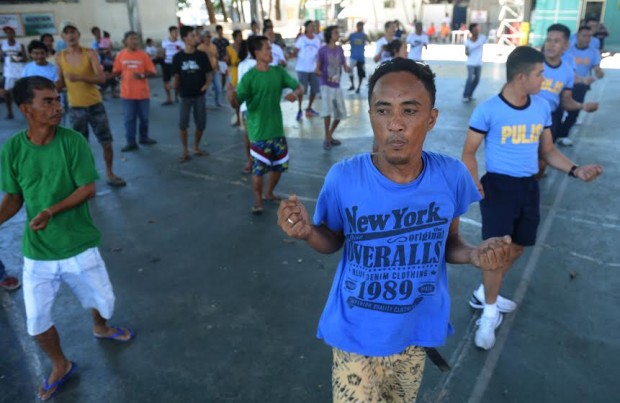 March 26, 2017 - A drug surenderee dances  with other surerrenders, together with the San Pedro City Police, during a Barangay Base Rehabilitation Program on Therapeutical Community(TC) approach in San Vicente Covered Court at Barangay San Vicente sattelite office, San Pedro, Laguna.