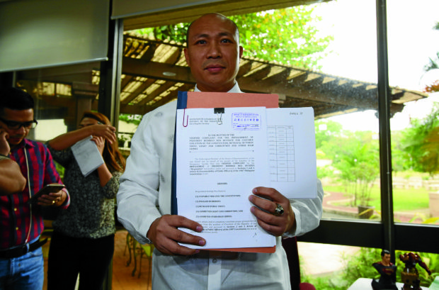 IMPEACEMENT COMPLAINT AGAINST DUTERTE / MARCH 16, 2017 Magdalo Party-List Representative Gary C. Alejano files an impeachment complaint against President Rodrigo Duterte at the Office of the Secretary-General, House of Representatives, March 16, 2017.  INQUIRER PHOTO / NIÑO JESUS ORBETA