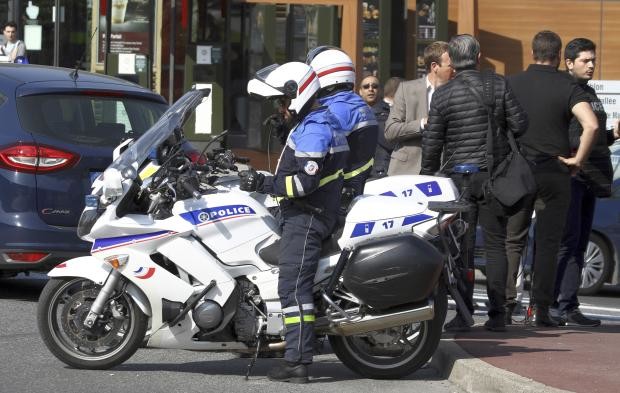 Police officers near high school in Grasse in France where shooting took place - 16 March 2017