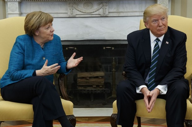 President Donald Trump meets with German Chancellor Angela Merkel in the Oval Office of the White House in Washington, Friday, March 17, 2017. (AP Photo/Evan Vucci)
