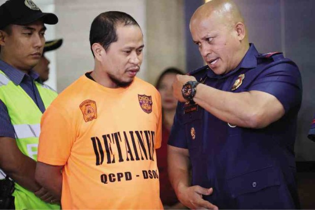 BOMB TRANSPORTER? PNP chief Director General Ronald dela Rosa presents Nasip Ibrahim, an alleged member of the Maute terrorist group, at Camp Crame on Tuesday. —JOAN BONDOC