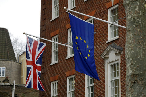 A European and British Union flags hang outside Europe House, the European Parliament's British offices in London, Monday, March 20, 2017. Britain's government will begin the process of leaving the European Union on March 29, starting the clock on the two years in which to complete the most important negotiation for a generation.AP PHOTO
