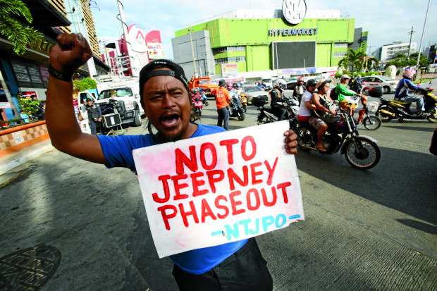 A member of the transport group Piston joins the jeepney strike at Monumento, Caloocan City, on Feb. 27. —NIÑO JESUS ORBETA
