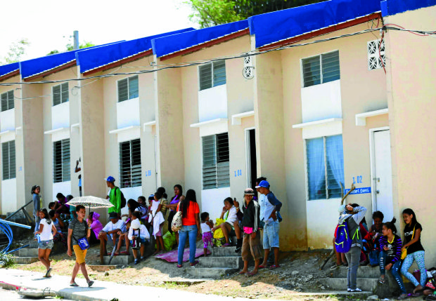 MARCH 10, 201 Housing units occupied by KADAMAY members at the Padre Pio de Pandi Resettlement Project, Barangay Cacarong Bata, Pandi, Bulacan.Padre Pio de Pandi Resettlement Project, Barangay Cacarong Bata, Pandi, Bulacan. INQUIRER PHOTO/LYN RILLON