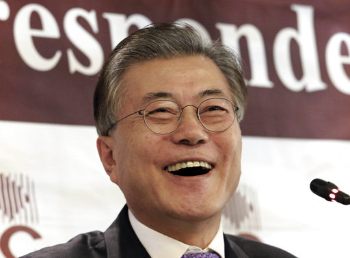 In this Dec. 15, 2016 file photo, possible South Korean presidential contender Moon Jae-in laughs during a press conference at the Seoul Foreign Correspondents Club in Seoul, South Korea. With South Korea’s Constitutional Court stripping President Park Geun-hye of power, the country slips into a political whirlwind building up to a presidential election likely in early May. Moon, who lost to Park in 2012, is now the clear presidential favorite. AP FILE PHOTO