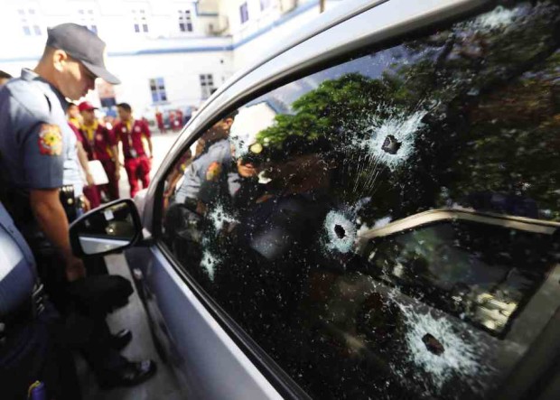 Police: Victim’s car was shot 16 times. —MARIANNE BERMUDEZ