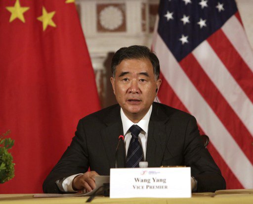 Chinese Vice Premier Wang Yang makes remarks during the closing session of the seventh US-China Strategic and Economic Dialogue (S&ED) at the US State Department  in Washington DC, June 24, 2015. AFP Photo/ Chris Kleponis / AFP PHOTO / CHRIS KLEPONIS