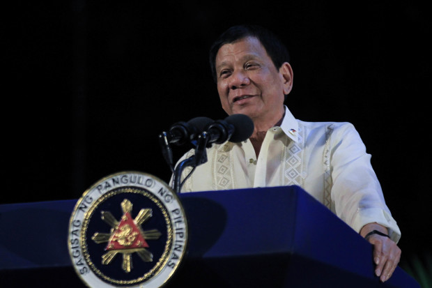 President Rodrigo Roa Duterte says in jest that he may have been an average student way back yet he now calls the shots and even has cabinet members who've had excellent academics currently working under him during the Digong's Day for Women at the Kalayaan Grounds in Malacañang on March 31, 2017. KING RODRIGUEZ/Presidential Photo