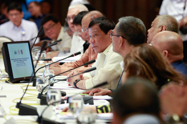 President Rodrigo Roa Duterte presides over the National Peace and Order Council (NPOC) Meeting and Joint Armed Forces of the Philippines-Philippine National Police (AFP-PNP) Command Conference at the Heroes Hall in Malacañan Palace on March 31, 2017. REY BANIQUET/Presidential Photo