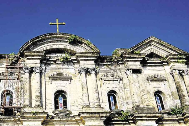 Sections of columns and moldings on the facade of the St. Martin de Tours Basilica in Taal town in Batangas fell off when the earthquake struck last week. —JOEL MATARO / CONTRIBUTOR