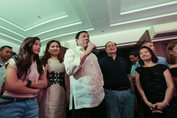 President Rodrigo Roa Duterte gives his birthday message to Former President and Incumbent Pampanga Second District Representative Gloria Arroyo who celebrated her 70th birthday at La Vista Subdivision in Quezon City on April 5, 2017. Also in the photo are the President's daughter Veronica, his partner Honeylet Avanceña and the former President's husband Jose Miguel Arroyo. ALBERT ALCAIN/Presidential Photo