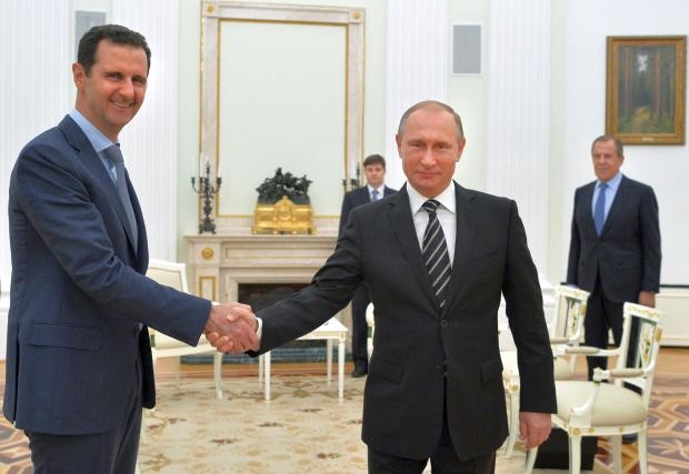 Bashar Assad with Vladimir Putin at the Kremlin - 20 Oct 2015