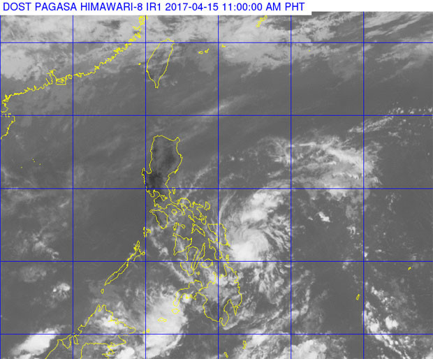 This satellite photo provided by Pagasa shows Tropical Depression Crising approaching the south-western tip of Samar Island.