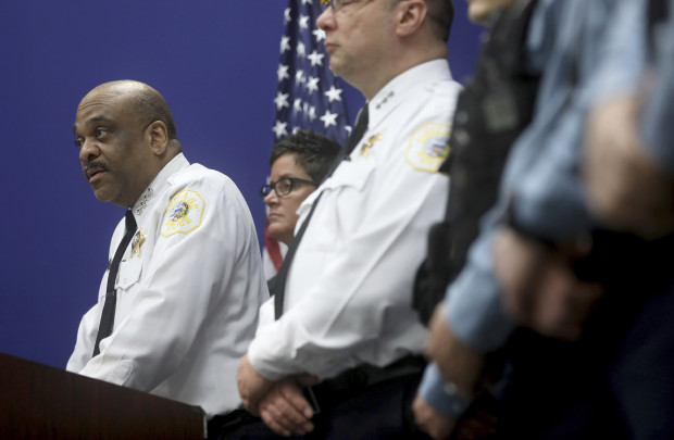 CORRECTS TO 10TH DISTRICT OFFICERS, NOT AREA 10 OFFICERS - Chicago Police Department Superintendent Eddie Johnson stands with 10th District officers as he talks with reporters about charging the first of several juvenile offenders from the March 19 criminal sexual assault incident broadcast on Facebook, during a press conference Sunday, April 2, 2017, at the City of Chicago Public Safety Headquarters.  (Michael Tercha/Chicago Tribune via AP)