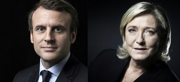 A combination of pictures made on April 23, 2017 shows French presidential election candidate for the En Marche ! movement Emmanuel Macron (L) and French presidential election candidate for the far-right Front National (FN) party Marine Le Pen (R) posing in Paris. Far-right leader Marine Le Pen and centrist Emmanuel Macron were on course April 23 to qualify for the runoff in France's presidential election, initial projections suggested.  / AFP PHOTO / Eric FEFERBERG AND JOEL SAGET