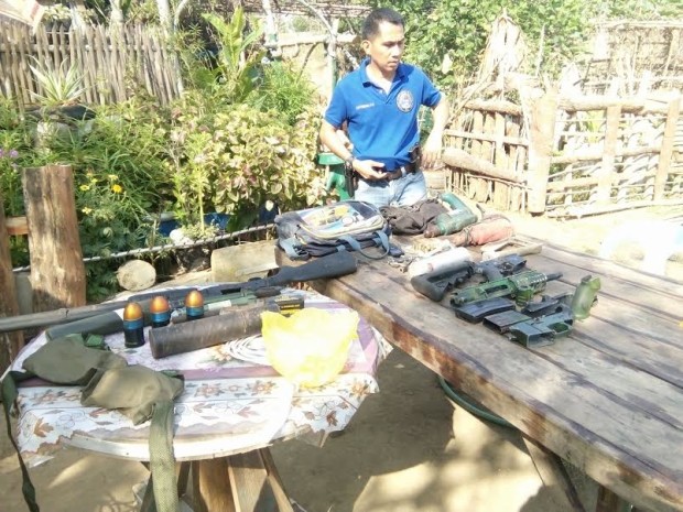 Ilocos Norte police seize high-powered firearms from the home of Delfin Guiang in Currimao, Ilocos Norte on Apr. 28, 2017.   Three people died in an ensuing firefight with the police, but the homeowner, Guiang, was able to flee. -- Photo from the Facebook page of Joey Quaiot