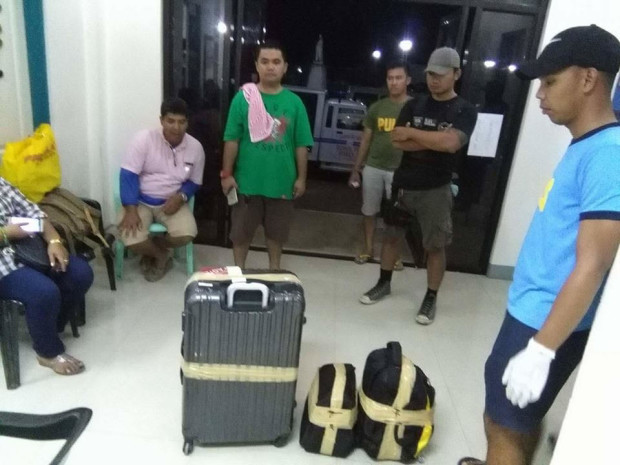 The luggage allegedly containing bomb components and belonging to Supt. Maria Cristina Nobleza and Renierlo Dongon, are turned to the police. (PHOTO BY LEO UDTOHAN / INQUIRER VISAYAS)