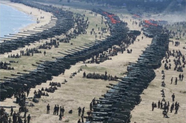 Balls for fire shoot out of the muzzles of hundreds of North Korean tanks and artillery pieces during the firing drill on April 26, 2017, which Pyongyang said was the largest ever. SCREENGRAB FROM NORTH KOREAN RODONG SINMUN