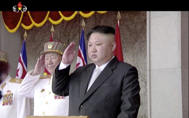 In this image made from video broadcast by North Korean broadcaster KRT, North Korea's leader Kim Jong Un salutes during a parade at Kim Il Sung Square in Pyongyang, Saturday, April 15, 2017. North Korean leader Kim Jong Un has appeared in a massive parade in the capital, Pyongyang, celebrating the birthday of his late grandfather and North Korea founder Kim Il Sung. (KRT via AP)