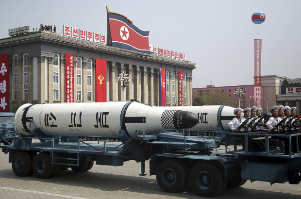 In this Saturday, April 15, 2017, file photo, a submarine missile is paraded across Kim Il Sung Square during a military parade in Pyongyang, North Korea to celebrate the 105th birth anniversary of Kim Il Sung, the country's late founder and grandfather of current ruler Kim Jong Un. North Korea's big day, the anniversary of the birth of its founding leader, Kim Il Sung, came and went with no underground nuclear test by the North, and no pre-emptive strikes off the deck of the USS Carl Vinson aircraft carrier sent to waters off the Korean Peninsula by President Donald Trump. Just hours before Vice President Mike Pence began his visit to Seoul on Sunday, Pyongyang fired off a ballistic missile — but it appears to have exploded seconds after it got off the ground. (AP Photo/Wong Maye-E, File)