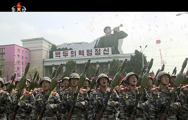 In this image made from video broadcast by North Korean broadcaster KRT, soldiers take part in a parade at Kim Il Sung Square in Pyongyang, Saturday, April 15, 2017. North Korean leader Kim Jong Un has appeared in a massive parade in the capital, Pyongyang, celebrating the birthday of his late grandfather and North Korea founder Kim Il Sung. (KRT via AP)