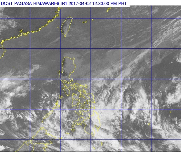 Scattered clouds hover over most of the Philippine archipelago in this satellite photo released by the Pagasa at 12:30 p.m. Sunday, April 2, 2017. PAGASA IMAGE