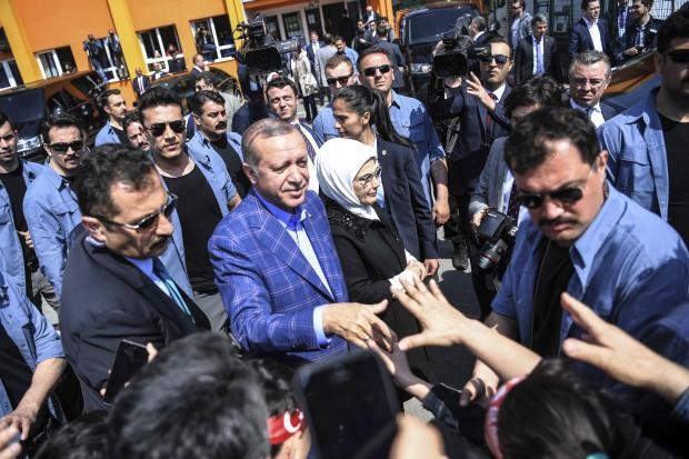 Recep Tayyip Erdogan and wife Emine after voting - 16 April 2017