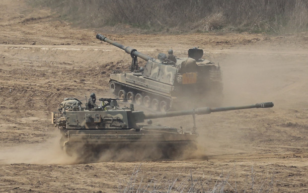 South Korean Army K-9 self-propelled howitzers move during the annual exercise in Paju, South Korea, near the border with North Korea, Saturday, April 29, 2017. A North Korean mid-range ballistic missile apparently failed shortly after launch Saturday, South Korea and the United States said, the third test-fire flop just this month but a clear message of defiance as a U.S. supercarrier conducts drills in nearby waters. (AP Photo/Ahn Young-joon)