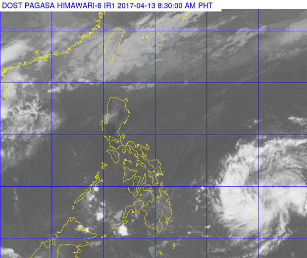 The country can expect clouds and isolated rain as Filipinos observe Maundy Thursday, April 13, 2017, Pagasa said. The satellite image shows scattered clouds over the archipelago as a low pressure area swirls on the right. PAGASA IMAGE