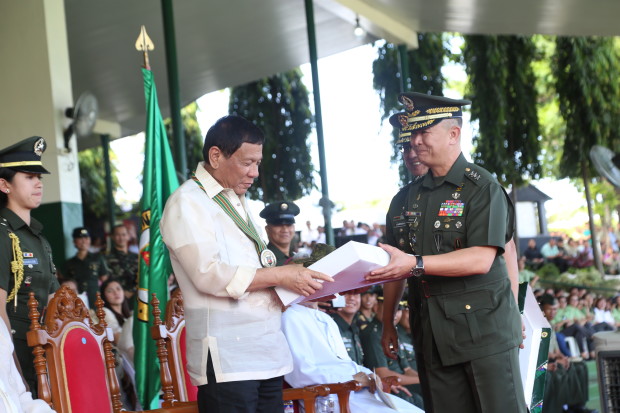The Philippine Army gifts President Rodrigo Duterte a set of Army battle dress uniform and a canteen cup that symbolizes his support to the troops./OACPA
