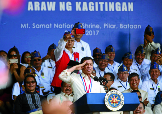 President Rodrigo Roa Duterte goves a snappy salute to the veterans as je leads the observance of 75th year of Day of Valor "Araw ng Kagitingan" at the Dambana ng Kagitingan, Mt. Samat National Shrine, Pilar, Bataan, April 9, 2017. Araw ng Kagitingan pays tribute to the Filipinos who fought in Bataan in defense of freedom and democracy. Despite the trials of defeat, the captured soldiers stood strong and heroes emerged from the event. INQUIRER PHOTO / NIÑO JESUS ORBETA