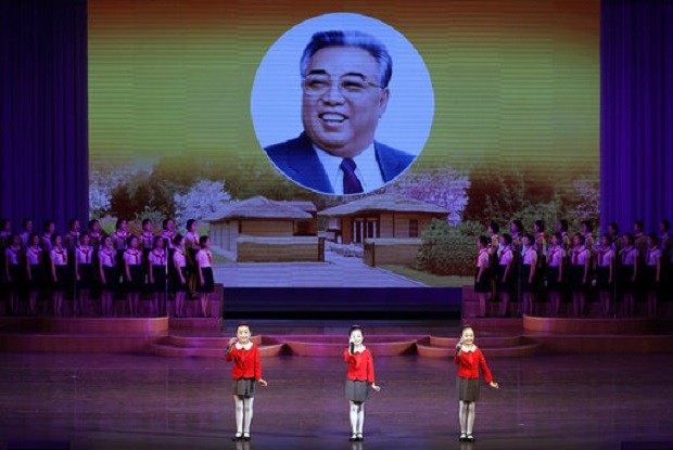 North Korean school children perform at the Mangyongdae Children's Palace while an image of their late leader Kim Il Sung is projected on a screen Friday, April 14, 2017, in Pyongyang, North Korea. Amid rising regional tensions, Pyongyang residents have been preparing for North Korea's most important holiday: the 105th birth anniversary of Kim Il Sung, the country's late founder and grandfather of current ruler Kim Jong Un. AP Photo