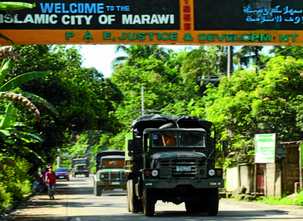 Government troops are seen in Marawi City. Friday, May 26, 2017 in Marawi City. Ongoing clashes between government security forces and ISIS-linked militants forced massive exodus of terrified residents in the city.Jeoffrey Maitem /Inquirer Mindanao 