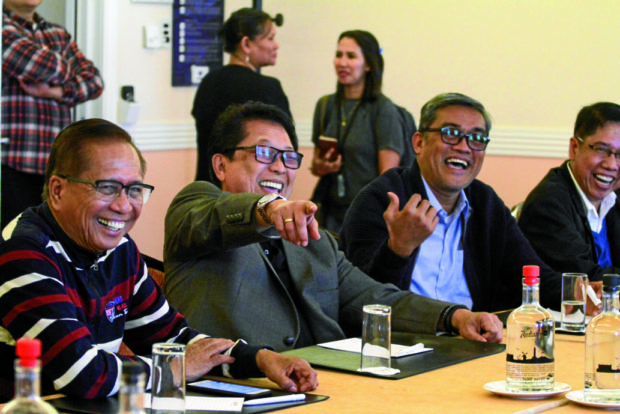 JOVIAL SPIRIT OF PEACE TALKS Government peace negotiators exchange jokes with their counterparts in the National Democratic Front of the Philippines before the formal resumption of their talks in The Netherlands. —KARLOS MANLUPIG