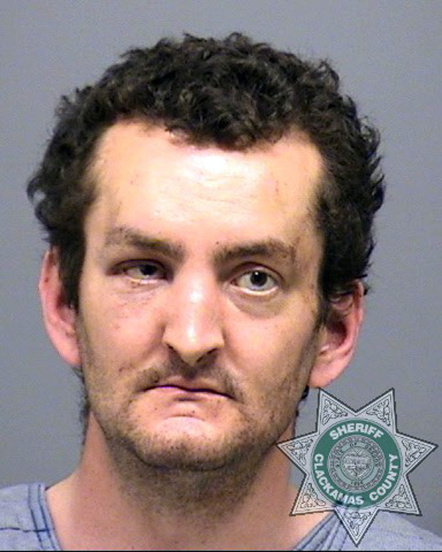 This undated photo provided by the Clackamas County Sheriff's office shows Joshua Webb. Webb has been arrested and charged with murder and attempted murder in connection with the stabbing of a grocery employee in Estacada, Ore., Sunday, May 15, 2017, and the discovery of his mother's body in the house they both shared. (Clackamas County Sheriff's Office via AP)