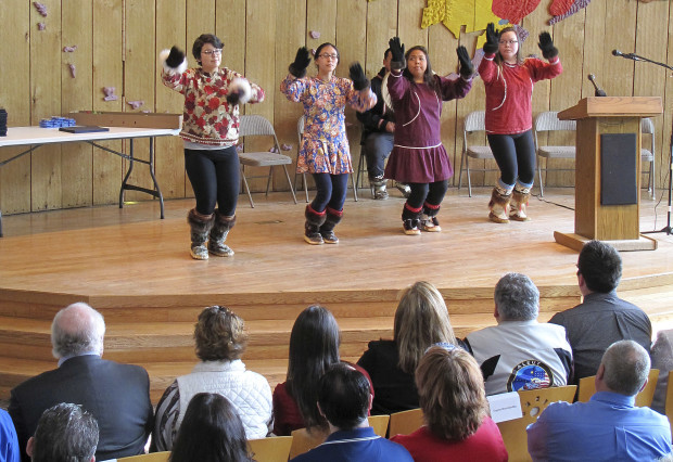 Cultural dancers perform at the Alaska Native Heritage Center, where Army honorary discharge papers were awarded to relatives of members of the Alaska Territorial Guard, a largely Native citizen militia that served to protect the U.S. territory from the threat of Japanese invasion during World War II, in Anchorage, Alaska, Friday, May 26, 2017. Relatives of 16 deceased members of the unit attended the ceremony at the Heritage Center to receive the posthumous honor. (AP Photo/Rachel D'Oro)